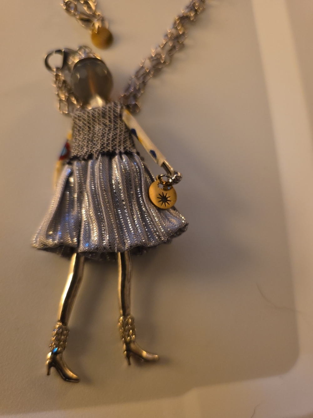 Doll Pendant Necklace in Silver with Gold Accents